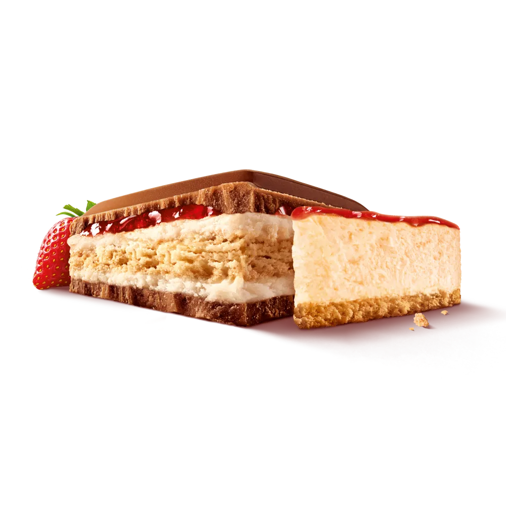 Ein Stück von der Milka Mmmax Schokolade der Sorte Strawberry Cheesecake